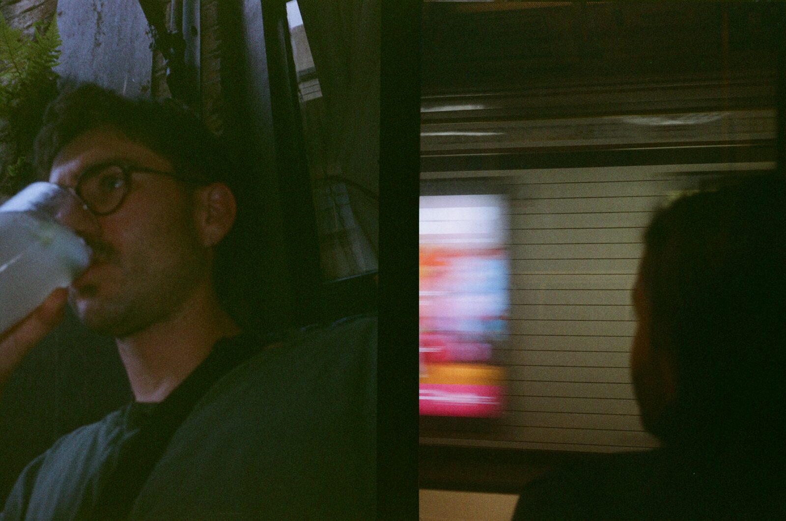 drinking from a bottle and a blurred tube platform
